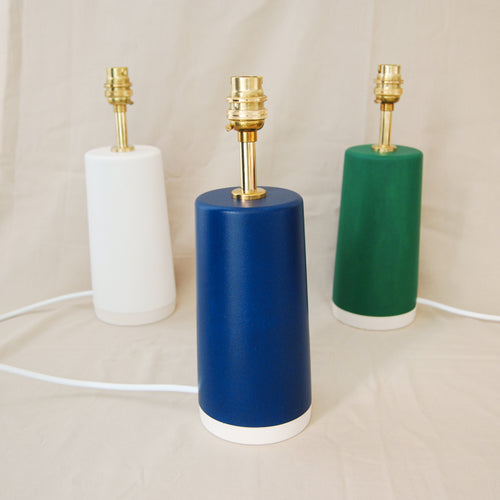 Block colour handmade table lamp bases in blue white and green all with brass light fittings