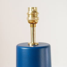 Load image into Gallery viewer, close up of brass fitting on a teal blue lamp base
