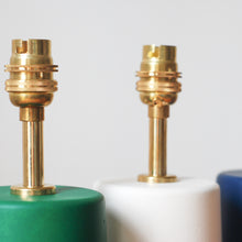 Load image into Gallery viewer, close up of brass fittings on a green lamp base with a white lamp base in the background
